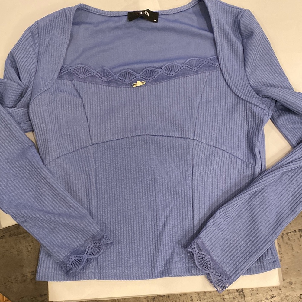 Long sleeve knit top, Size M.